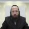ניירות שהודבקו בדבק העשוי מחמץ האם מותר להשהותם בפסח?- תמ"ב